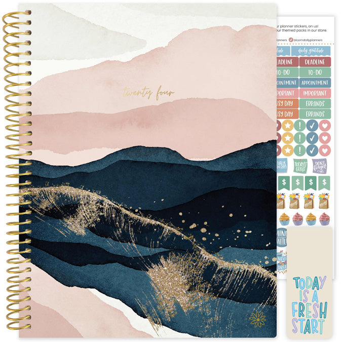 http://bloomplanners.com/cdn/shop/files/1_goldenhour_8.5_X11_bloomdailyplanners_calendaryear12month2024january-decemberdayplanneragendastickersbookmark_watermountainwatercolordreamygoldfoilabstractpaintingbluepinkblush.jpg?v=1689884263