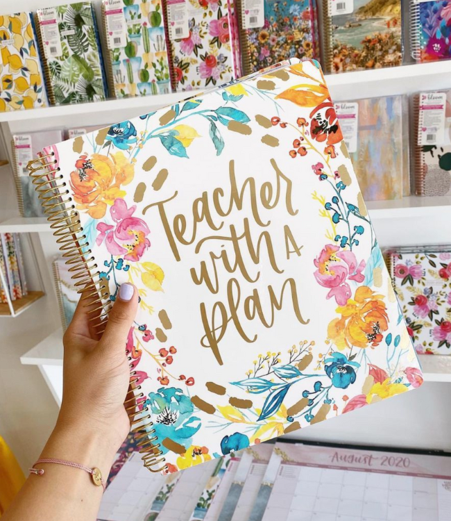 a bloom teacher planner displayed at a store.