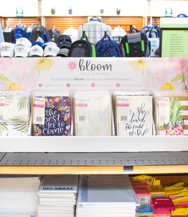 bloom products displayed in a college store.