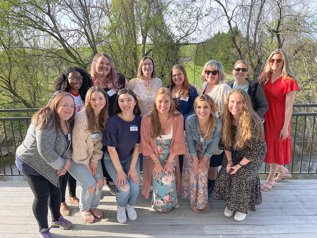 group of bloom community women outside on deck