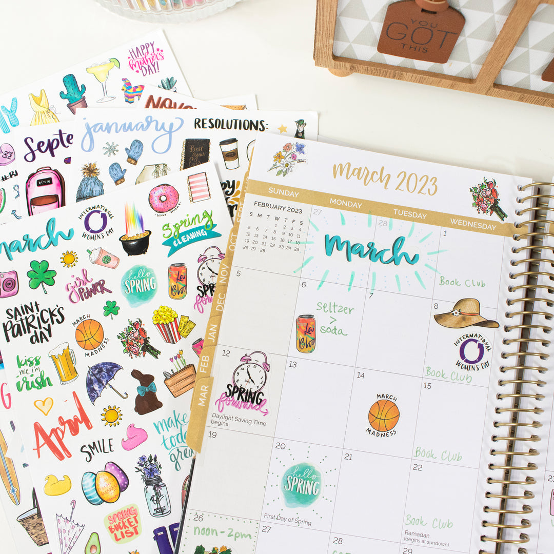 Vintage holiday hand-drawn planner stickers showcased in a colorful calendar layout.