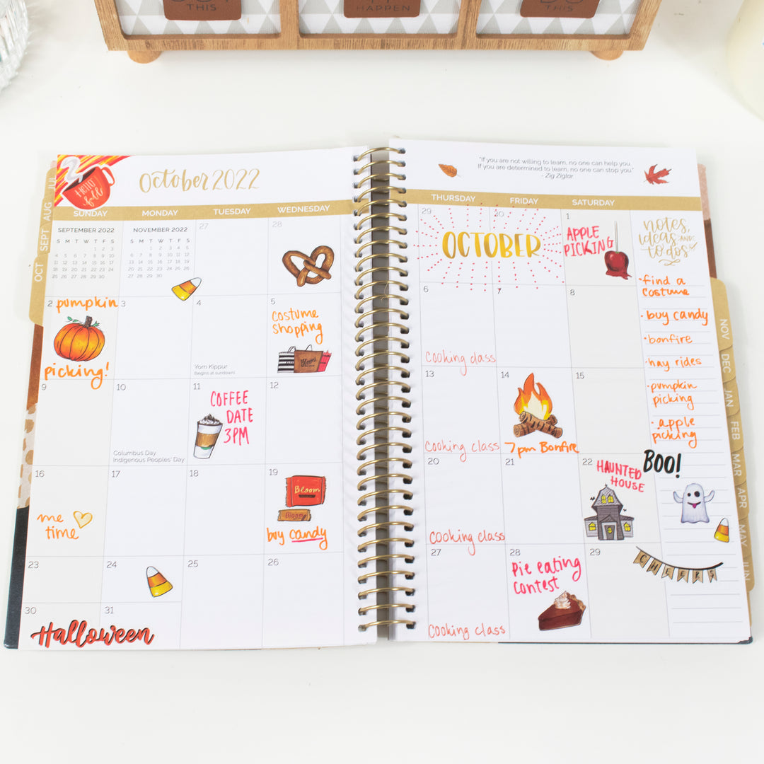 October 2022 planner page with vintage holiday hand-drawn seasonal stickers for planning activities and events.