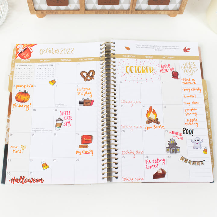 October 2022 planner page with vintage holiday hand-drawn seasonal stickers for planning activities and events.