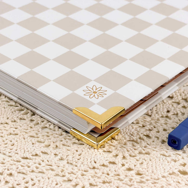 Binding edge of a 2027 planner with a metal corner.