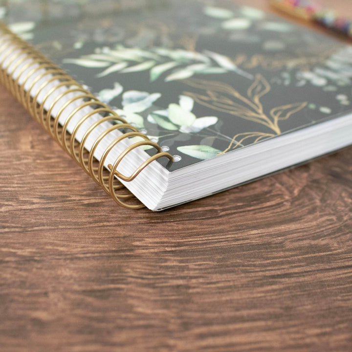 Eucalyptus soft cover planner with gold spiral binding and rounded page edges