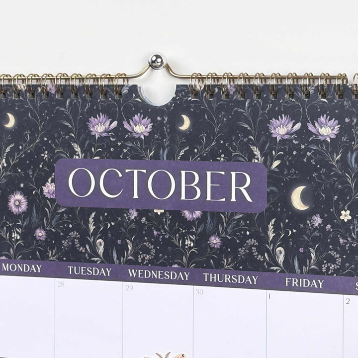 Calendar with floral design and 'October' text on a white background