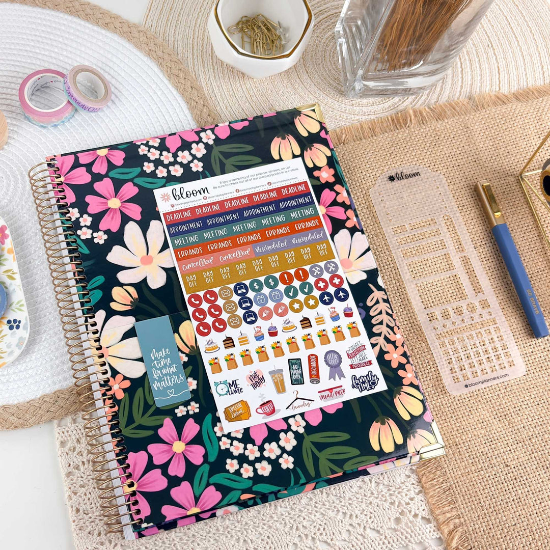 8.5 x 11 hard cover planner with colorful floral cover and spiral binding