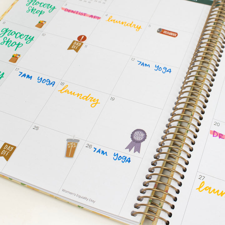 Calendar with colorful stickers on a white background
