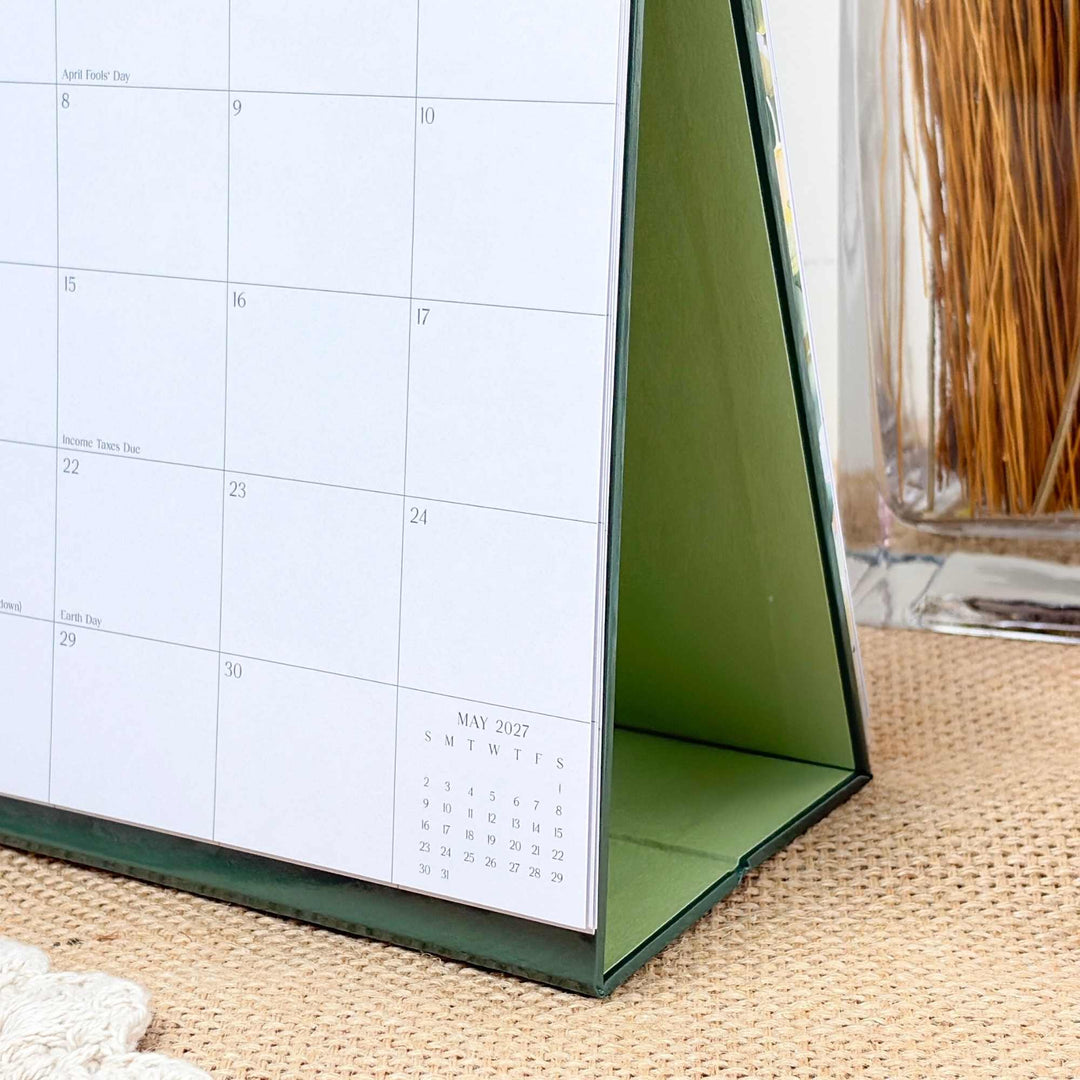 Side view of bloom Standing Desk Calendar showing the sturdy green self-standing easel base.