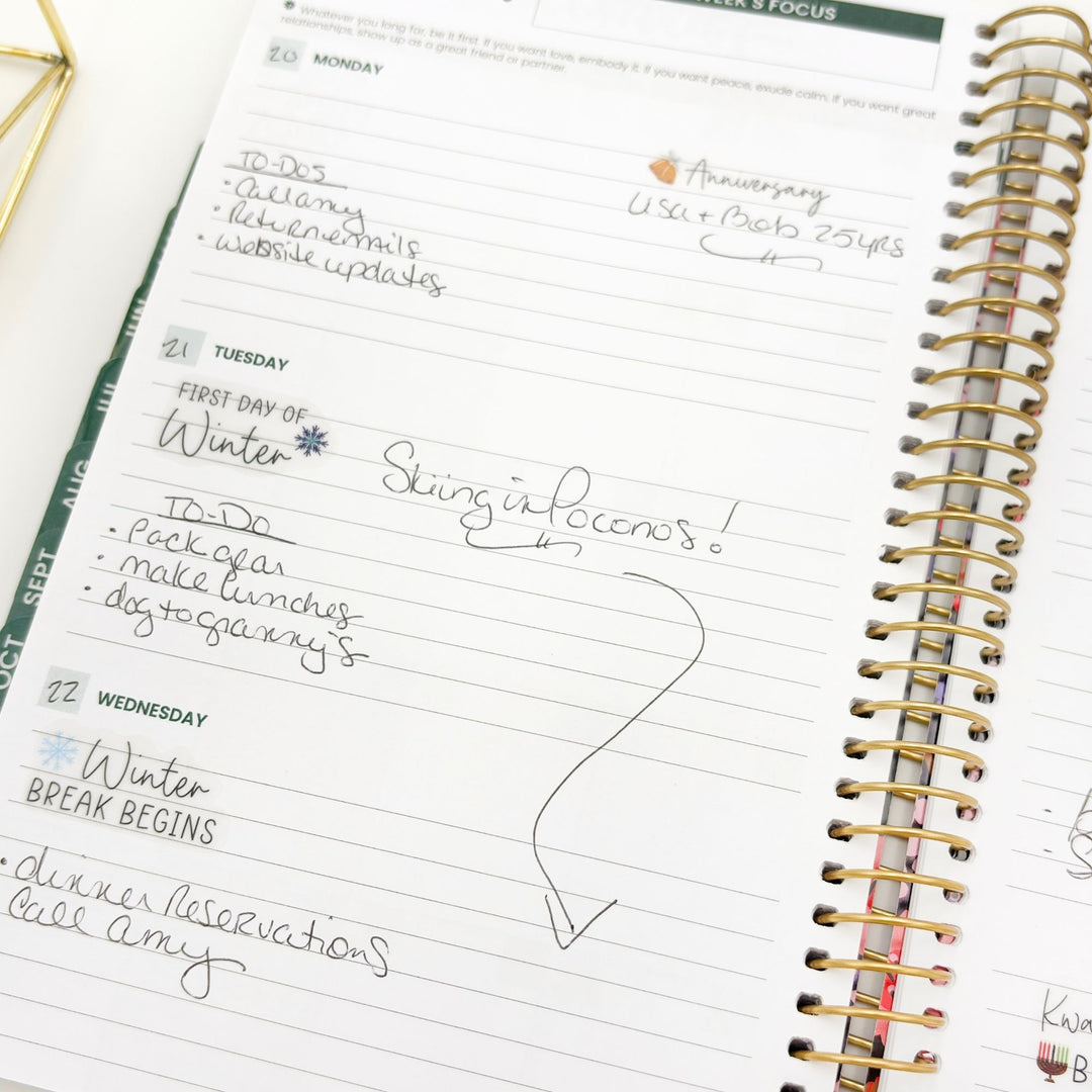 Weekly planner page with handwritten Winter celebration notes and sticker accents