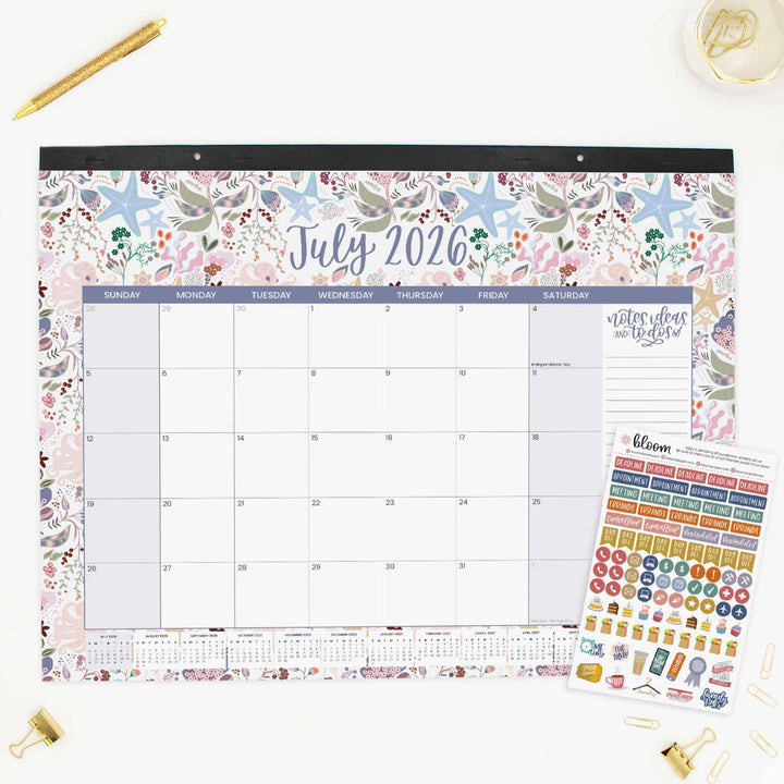 Floral-themed wall calendar for July 2026 with stickers on a white background
