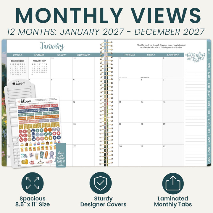 A monthly planner view showing an open spiral-bound planner for January through December 2027, with sticker sheets and planner tabs displayed beside it. Large text at the top reads 'MONTHLY VIEWS' and '12 MONTHS: JANUARY 2027 - DECEMBER 2027,' with feature icons at the bottom describing spacious 8.