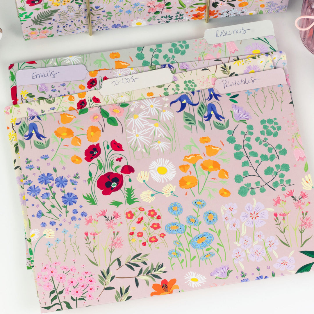 Floral patterned file folders on a white surface