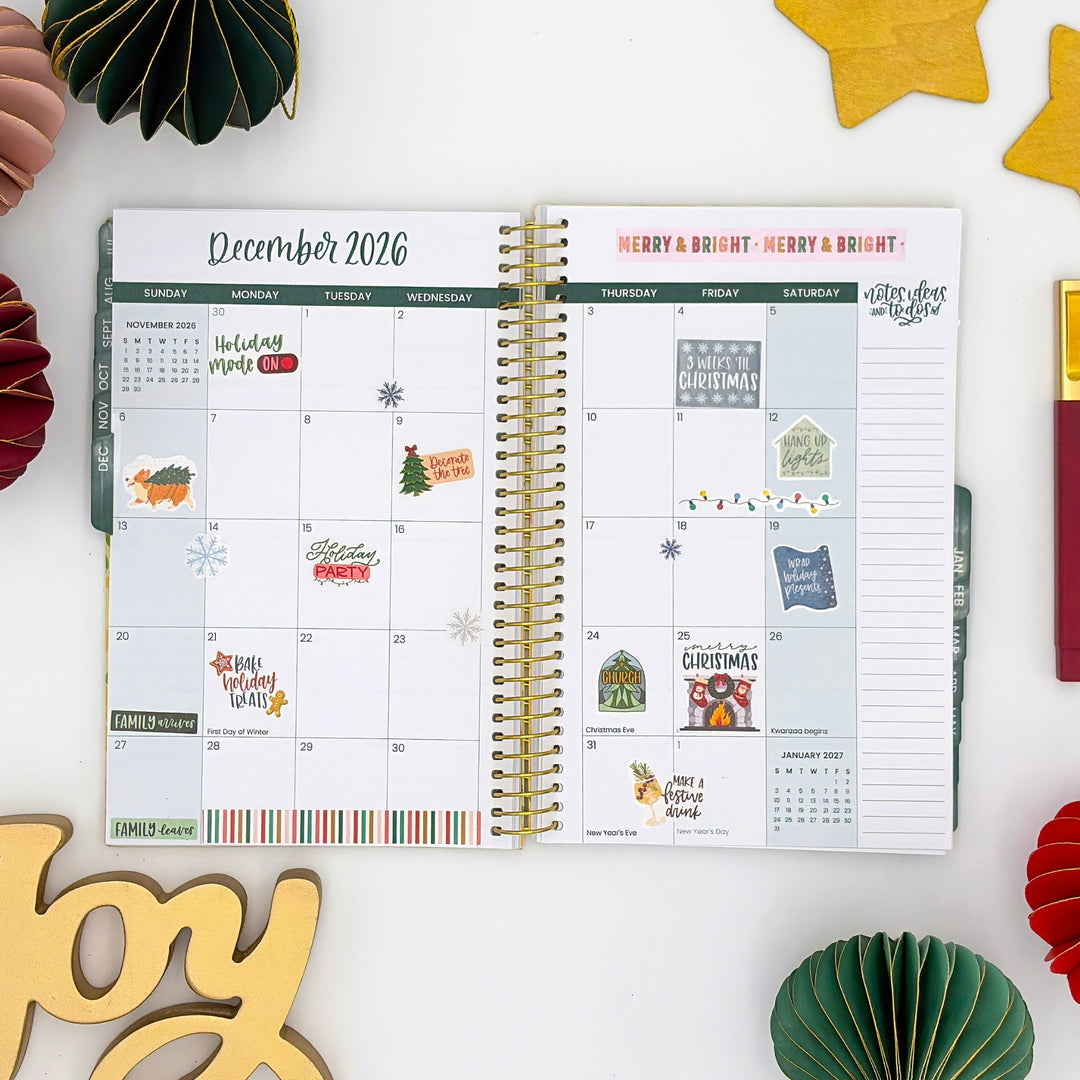Planner pages for December 2026 decorated with holiday sticker labels and icons