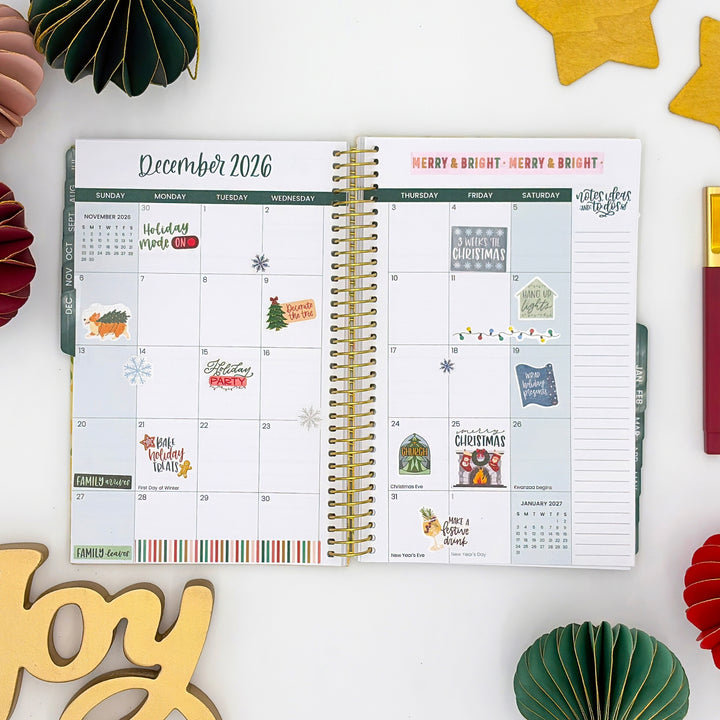 Planner pages for December 2026 decorated with holiday sticker labels and icons