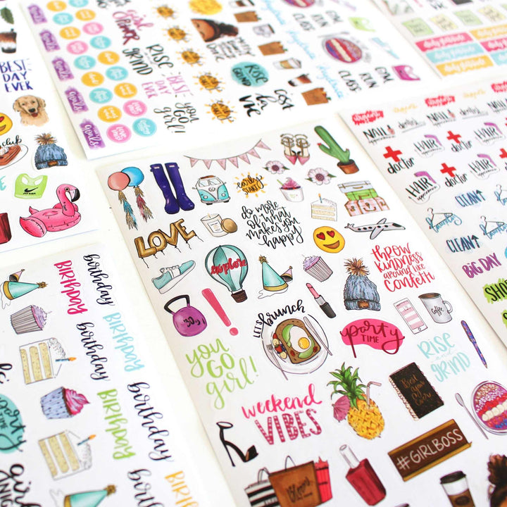 Collection of colorful stickers with various designs and text on a white background