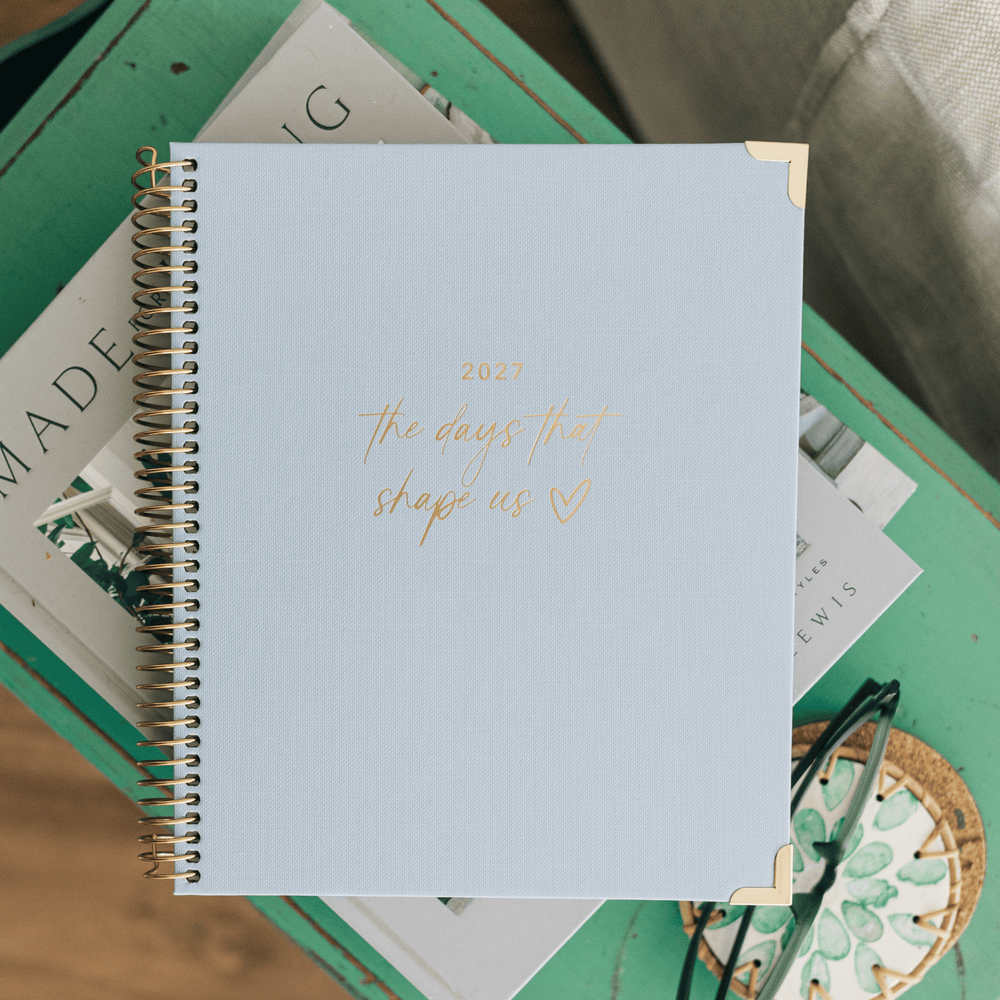 Christian planner cover with gold '2027 the days that shape us' title - hover