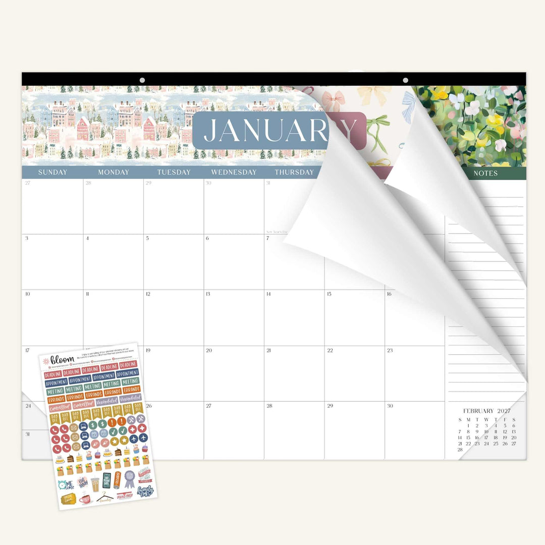 Wall calendar with January layout and a set of colorful stickers on a white background
