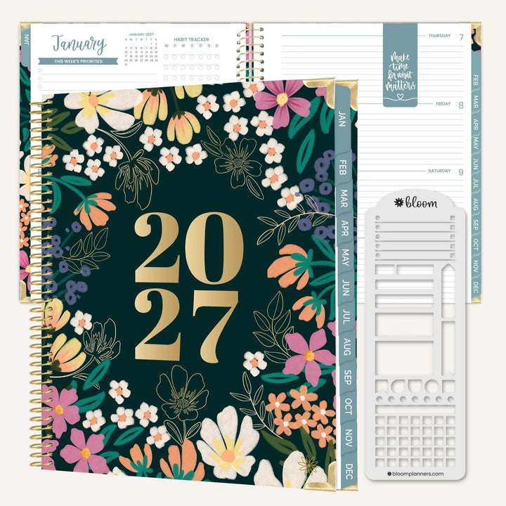 A 2027 spiral-bound planner shown open with floral cover pages and a white planner insert sheet. The cover features large gold '2027' text on a dark green background with multicolored flowers and gold botanical outlines.