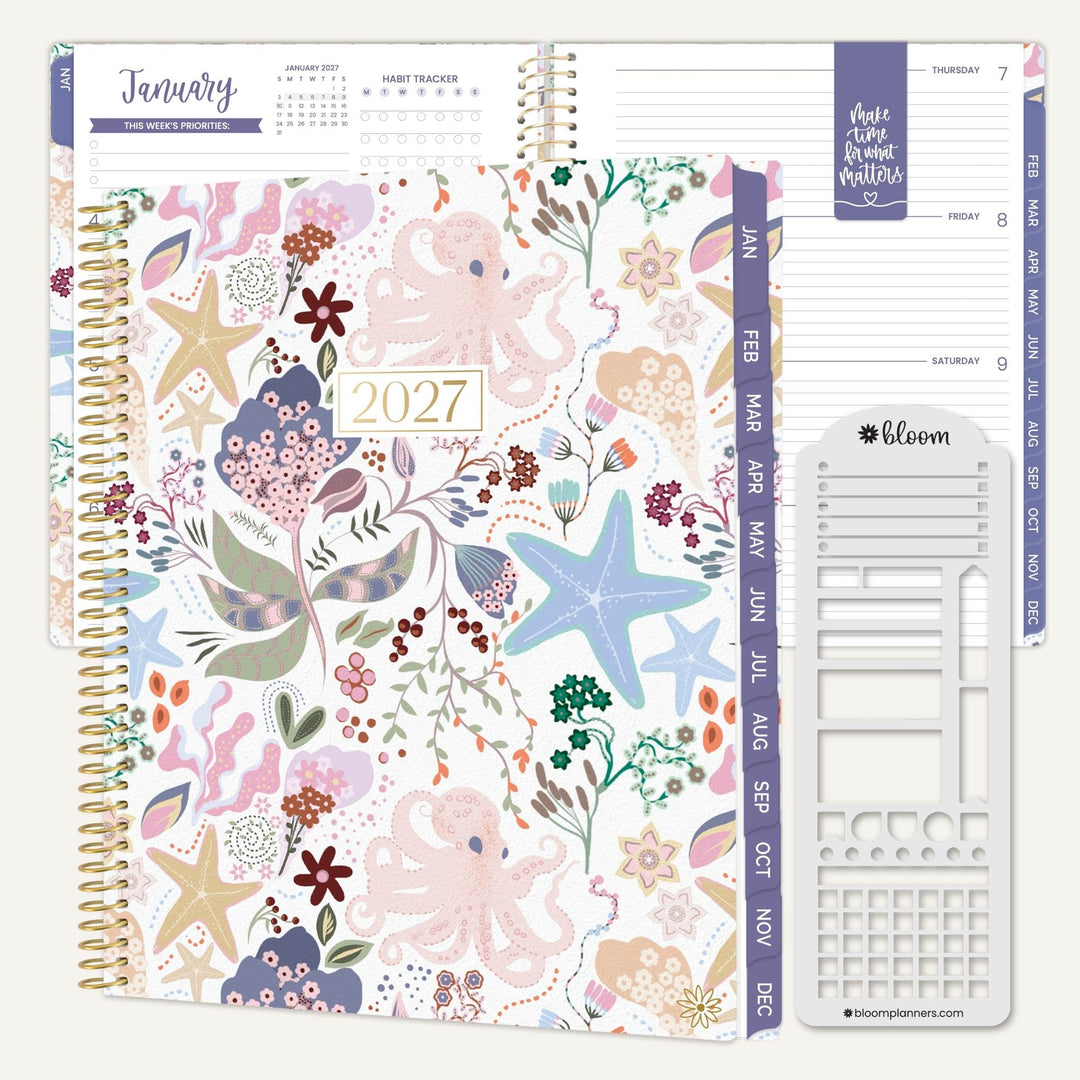 2027 planner open view with illustrated cover art and weekly schedule pages, spiral binding