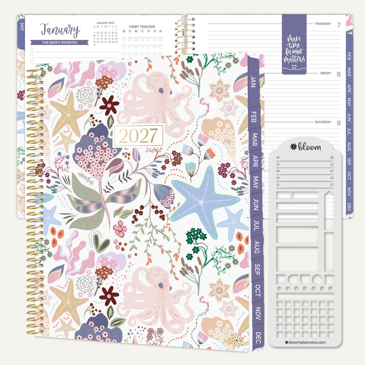 2027 planner open view with illustrated cover art and weekly schedule pages, spiral binding