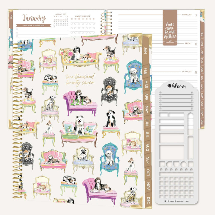 A spiral-bound planner insert set featuring a cream-colored page decorated with colorful illustrations of dogs lounging in elegant pink, purple, blue, and green chairs. The right side shows a white metal planner clip holder and gold-toned spiral binding.