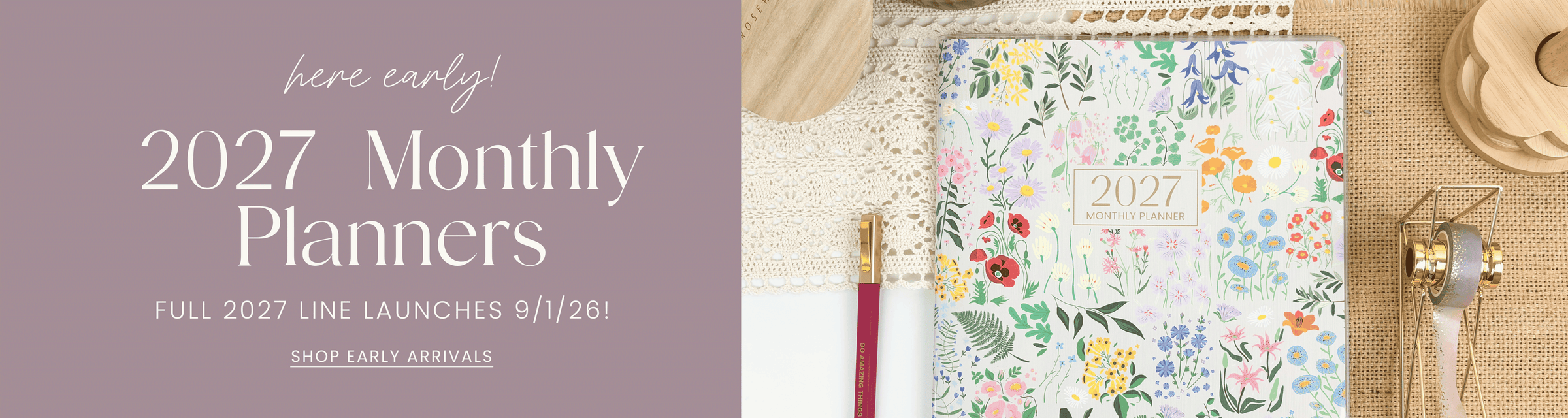 Promotional banner for 2027 Monthly Planners, showing a floral-patterned planner on a styled flat-lay with a pink pen, lace, and wooden beads on the right, alongside text on the left.