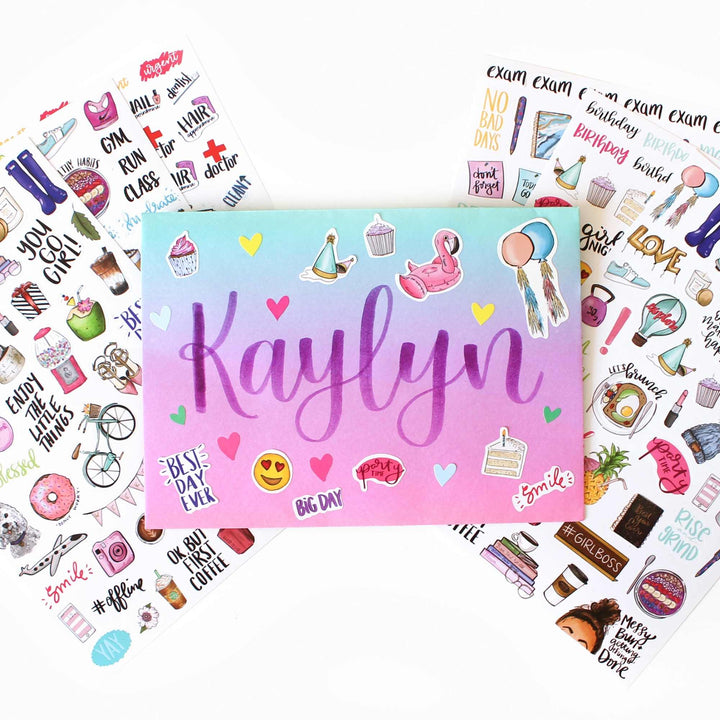 Sticker sheet with 'Kaylyn' in purple, surrounded by various small stickers on a white background.