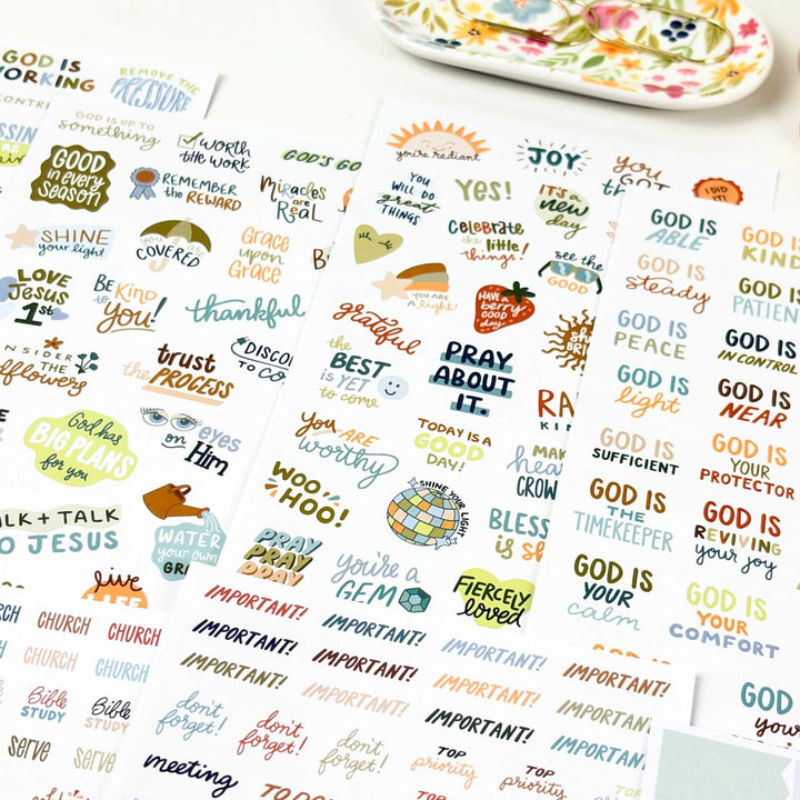 Detailed view of the handlettered quote stickers like "God Has a Plan for You." 