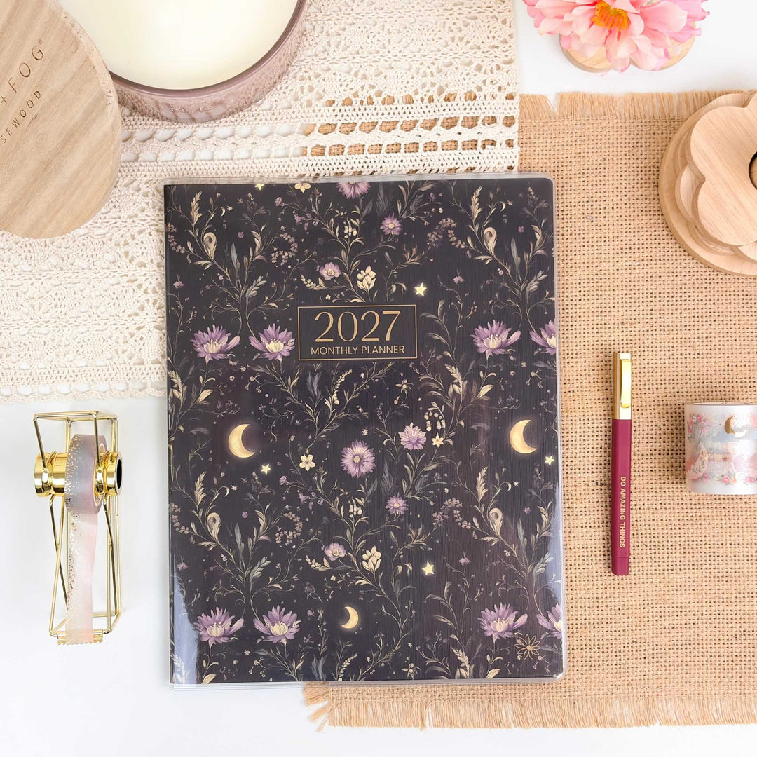 2027 planner with floral design on a decorative surface