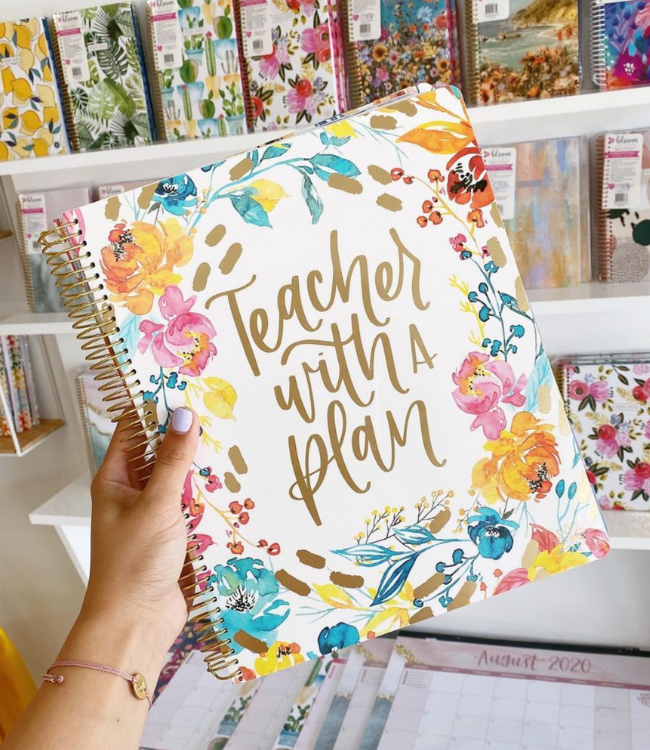 a bloom teacher planner displayed at a store. 