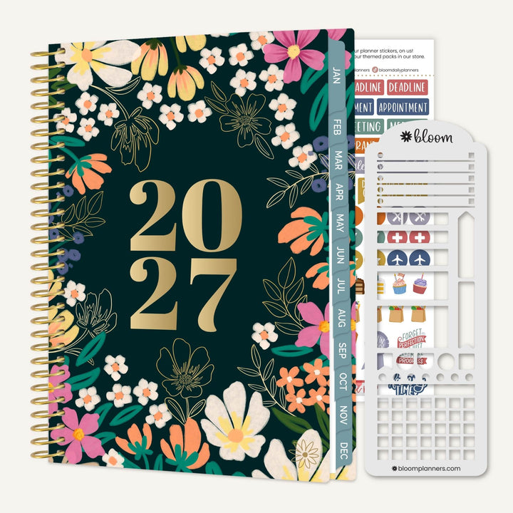 A 2027 spiral-bound planner with a dark green floral cover, gold foil '2027' text, multicolored flower illustrations, and a white bloom sticker sheet shown beside it on a light gray background.