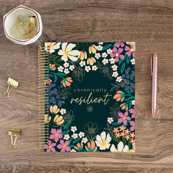 Notebook with floral design and &