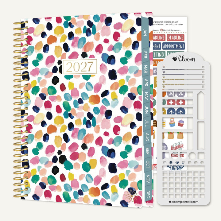 Confetti patterned cover of a 2027 bloom planner with a sticker sheet and stencil.