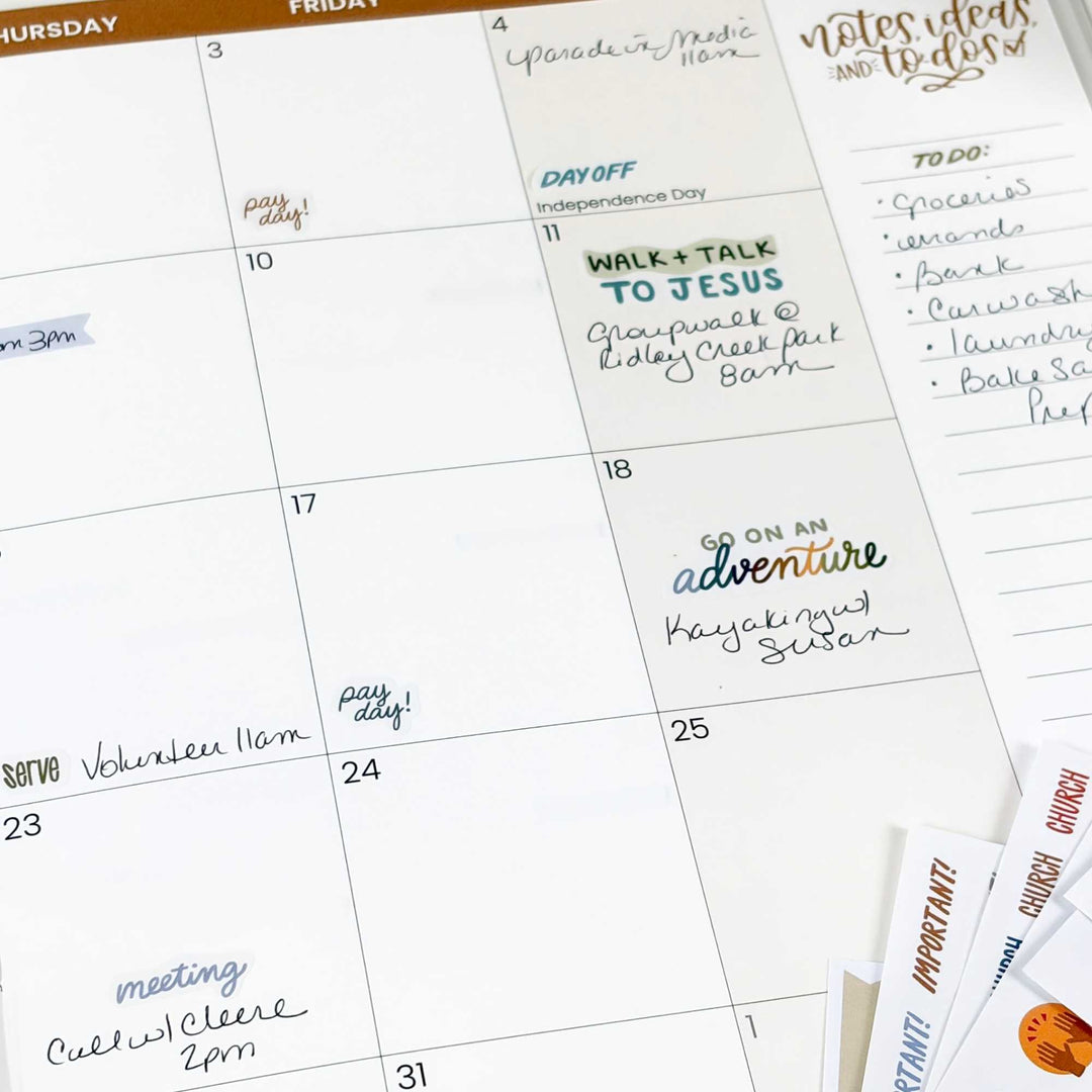 A planner with the sticker "go on an adventure' featured. 