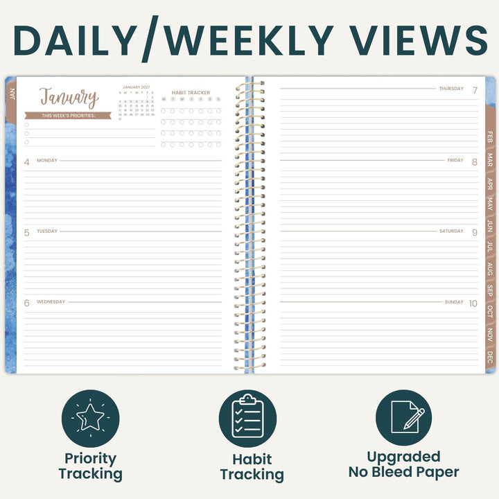 An open spiral-bound planner shown on a light beige background with the heading 'DAILY/WEEKLY VIEWS' at the top and three feature icons below: Priority Tracking, Habit Tracking, and Upgraded No Bleed Paper. The planner pages are mostly white with dark teal text and lines, plus small tan and blue decorative accents.