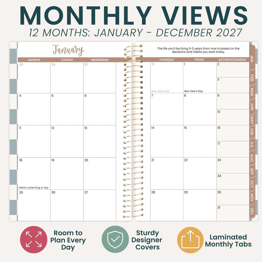 A 12-month spiral-bound planner page spread labeled 'MONTHLY VIEWS 12 MONTHS: JANUARY - DECEMBER 2027,' with beige and white pages, gold-toned spiral binding, and small feature icons at the bottom reading 'Room to Plan Every Day,' 'Sturdy Designer Covers,' and 'Laminated Monthly Tabs.'.