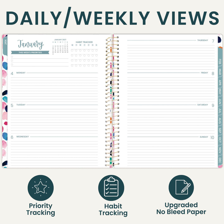 An open spiral-bound planner shown on a light beige background with the heading 'DAILY/WEEKLY VIEWS' at the top and three feature icons below: Priority Tracking, Habit Tracking, and Upgraded No Bleed Paper. The planner pages are mostly white with dark teal text and small multicolor decorative accents along the left and right margins.