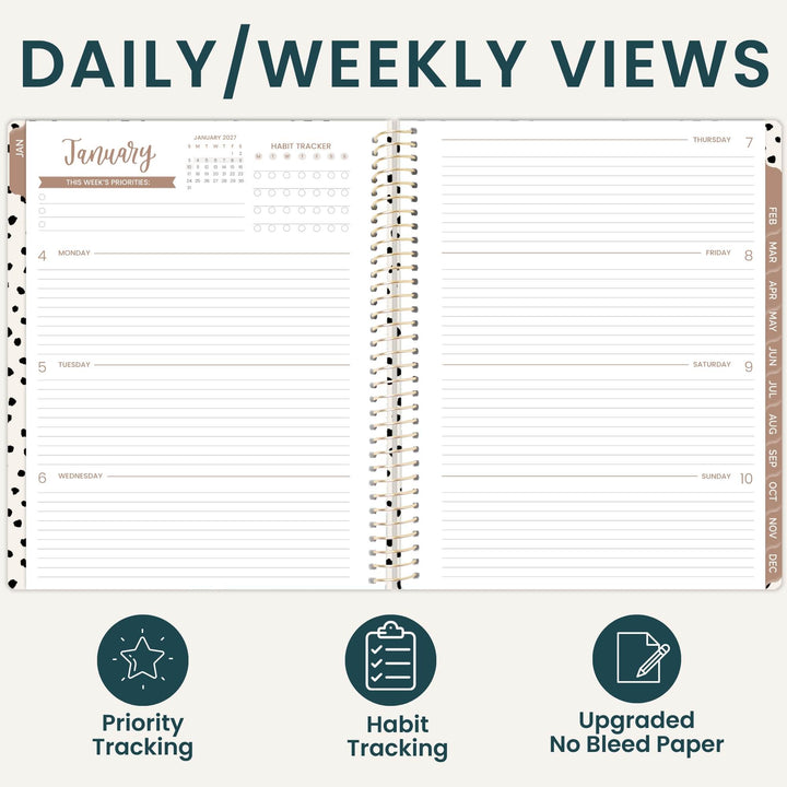 An open spiral-bound planner shown on a light beige background with the heading 'DAILY/WEEKLY VIEWS' at the top and three feature icons below: Priority Tracking, Habit Tracking, and Upgraded No Bleed Paper. The planner pages are mostly white with dark teal text and lines, plus tan accent bands and a tan right-hand date/index strip.