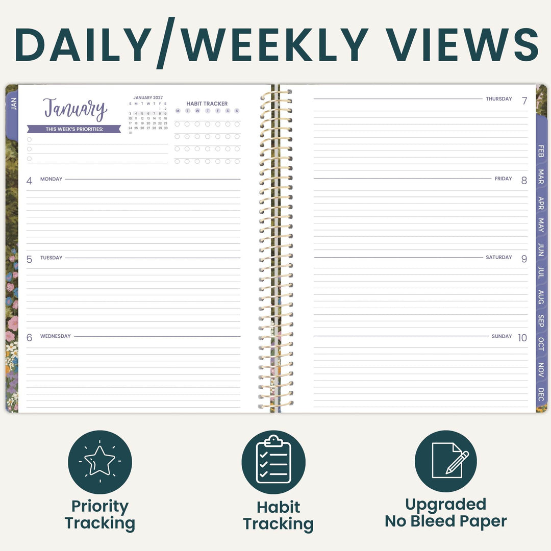An open spiral-bound planner shown from above on a light beige background, with the heading 'DAILY/WEEKLY VIEWS' at the top. The planner pages display lined daily and weekly layouts, a January calendar view, and vertical month tabs on the right edge.