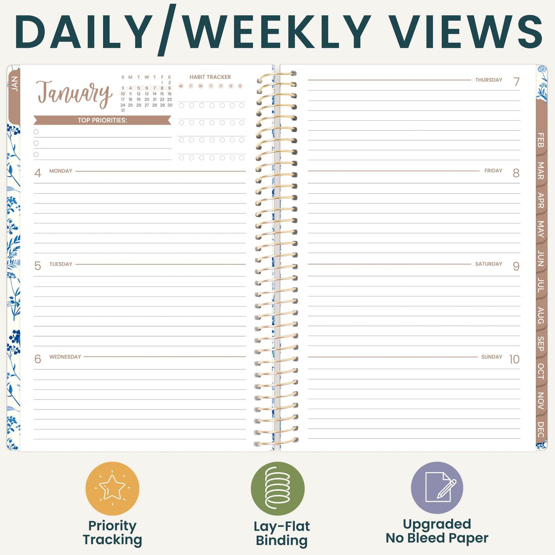 An open spiral-bound planner showing a daily and weekly view layout with lined calendar pages, decorative floral accents, and feature icons at the bottom reading Priority Tracking, Lay-Flat Binding, and Upgraded No Bleed Paper.