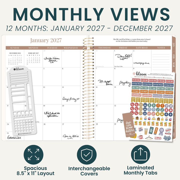 A promotional graphic for a monthly view planner showing a January 2027 calendar spread with spiral binding, handwritten notes, a white cover, and a sheet of colorful monthly tabs. Large text at the top reads 'MONTHLY VIEWS' and '12 MONTHS: JANUARY 2027 - DECEMBER 2027,' with feature icons below describing spacious 8.