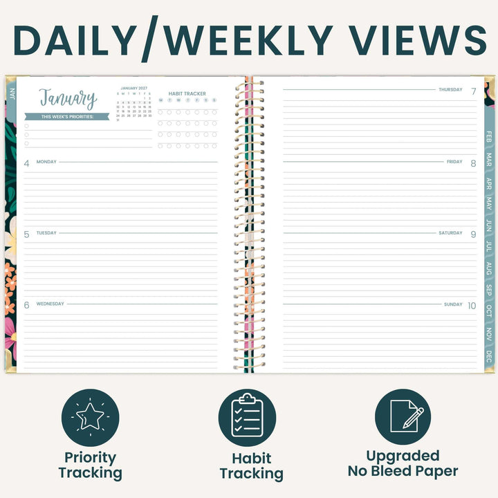 An open spiral-bound planner shown from the front with the heading 'DAILY/WEEKLY VIEWS' above it. The planner pages are white with teal and dark gray lined sections, a monthly calendar at left, and weekly columns on the right.