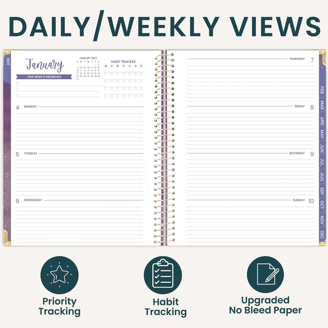 An open spiral-bound planner shown on a light beige background with the heading 'DAILY/WEEKLY VIEWS' at the top. The planner pages display lined daily and weekly layouts, with a January calendar view and habit tracker sections.