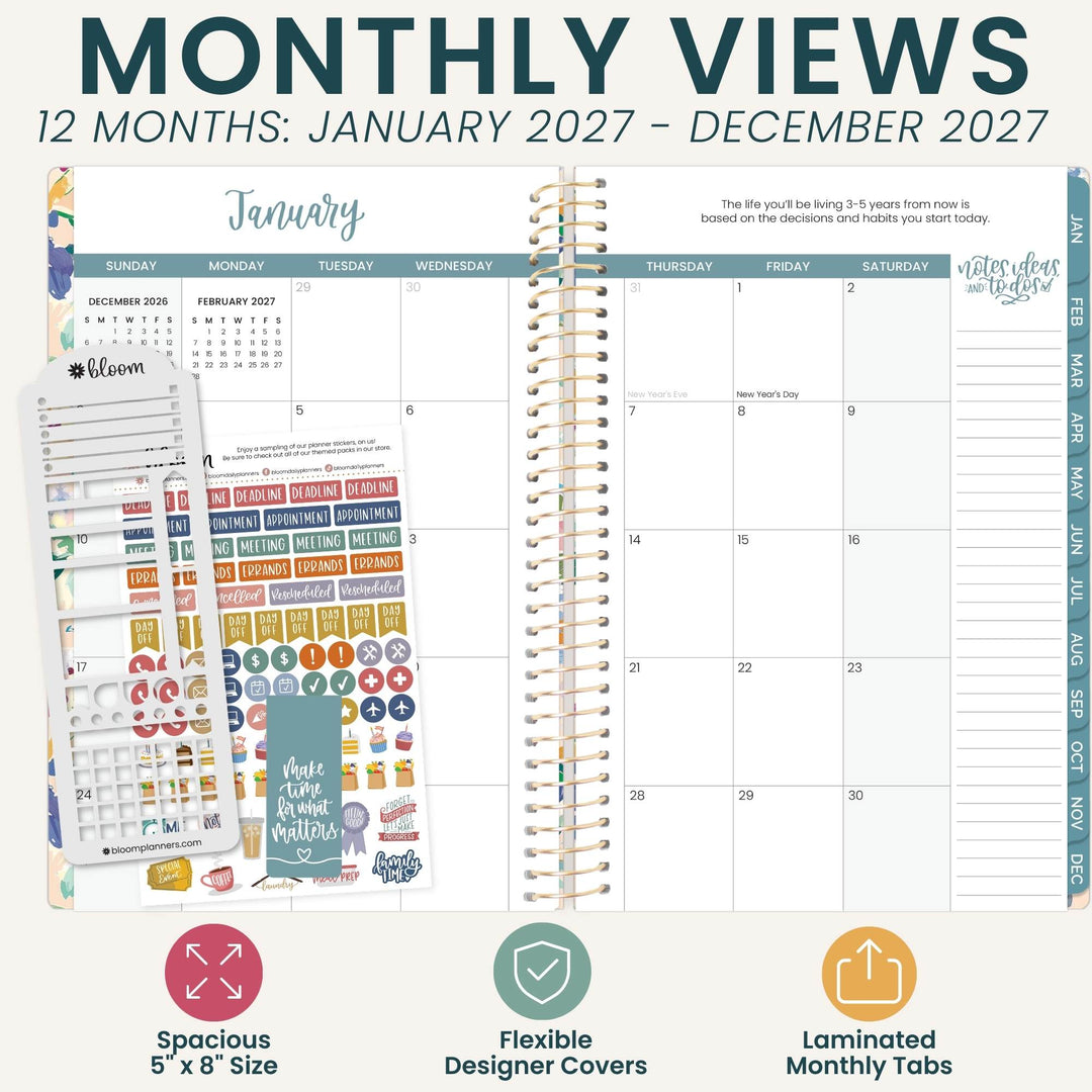 A planner product mockup showing a spiral-bound monthly calendar page with a January view, decorative planner stickers, and feature callouts reading 'MONTHLY VIEWS 12 MONTHS: JANUARY 2027 - DECEMBER 2027' plus 'Spacious 5" x 8" Size', 'Flexible Designer Covers', and 'Laminated Monthly Tabs'.