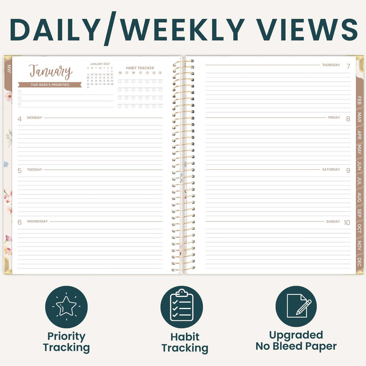 An open spiral-bound planner shown on a light beige background with the heading 'DAILY/WEEKLY VIEWS' at the top. The planner pages display a January weekly layout with lined sections for Monday through Sunday, habit tracker rows, and a calendar.