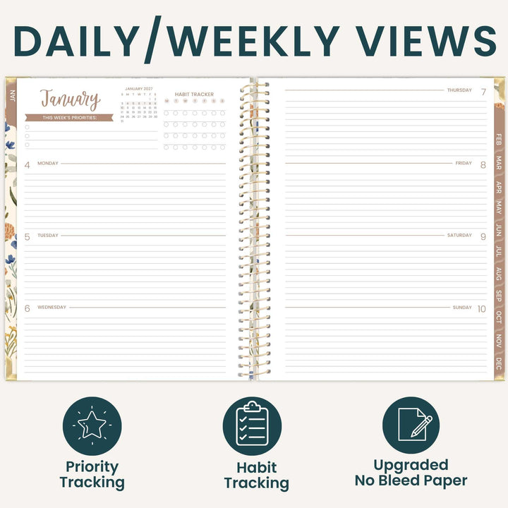 An open spiral-bound planner shown on a light beige background with the heading 'DAILY/WEEKLY VIEWS' at the top. The planner pages display a January weekly view with lined daily sections, a habit tracker, and decorative floral border details.