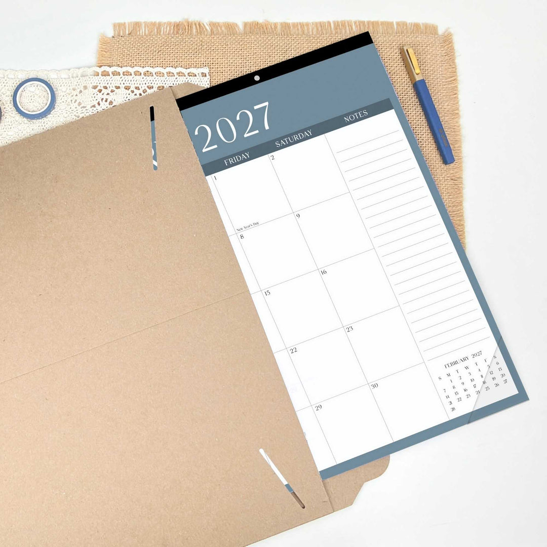 Calendar for 2027 with a pen on a textured surface