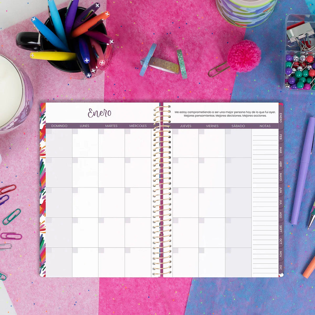 Calendar planner on a colorful background with stationery items