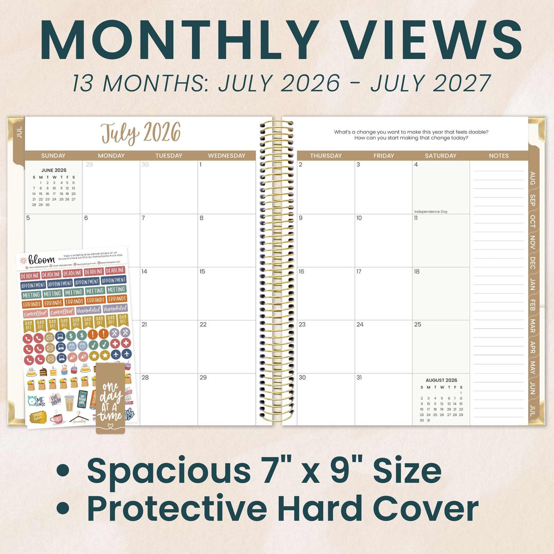 A month calendar spread on two pages with a white background. Gold font and headers. Free stickers and magnetic bookmark featured on the side of the planner.